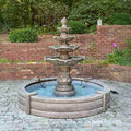 Massarelli 6' & 8' Fiberglass Fountain Basins with Cast Stone Surrounds.