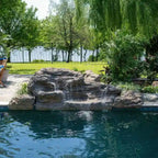 Cascades pool waterfall with natural rock design