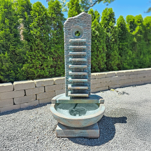 Tall block fountain in bowl
