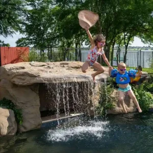 SUNSET GROVE Pool Waterfall by Universal Rocks